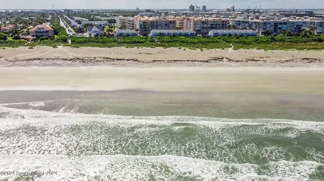 a front view of a building with street view