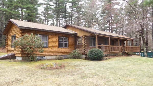 1 Breakneck Road Sturbridge, MA 01566 - Photo 1 of 30 a front view of a house with a garden
