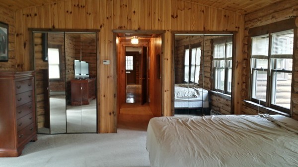 1 Breakneck Road Sturbridge, MA 01566 - Photo 24 of 30 a bedroom with a bed and window
