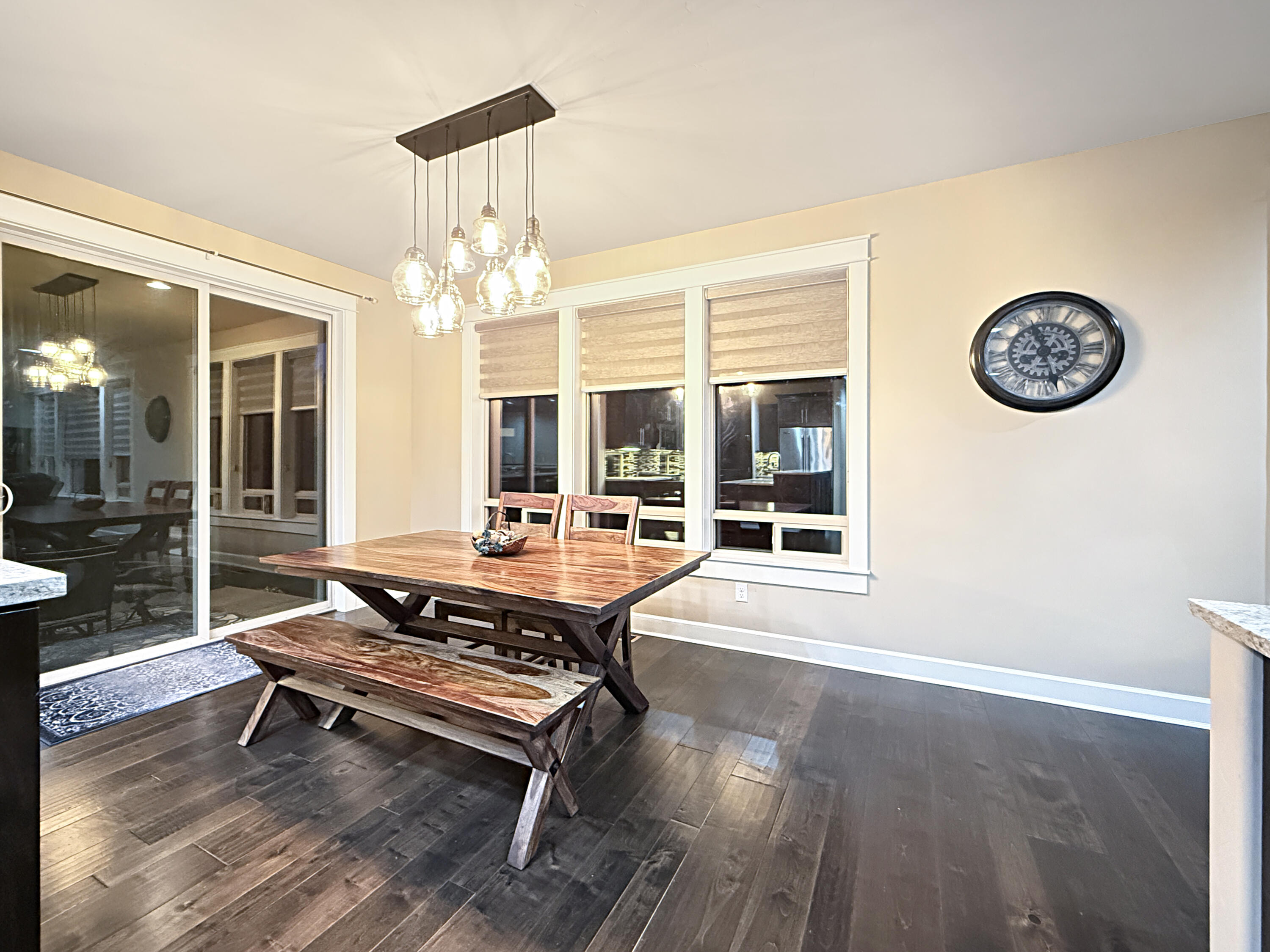 61072 Manhae Loop Bend, OR 97702 - Photo 9 of 63 a living room with furniture a table and a large window