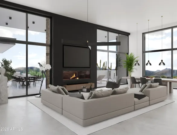 a living room with furniture potted plant and a flat screen tv