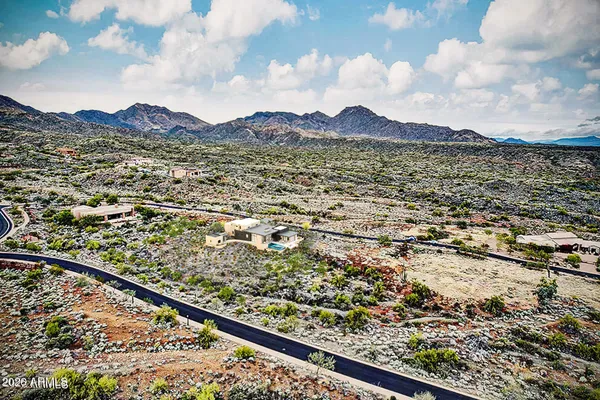 a kitchen with stainless steel appliances kitchen island granite countertop a sink and cabinets