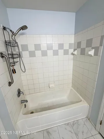 a bathroom with a bathtub