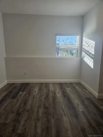 a view of a hallway with closet