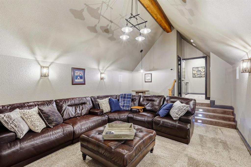 476 Hidden Valley Lane Coppell, TX 75019 - Photo 19 of 40 a living room with furniture and a potted plant