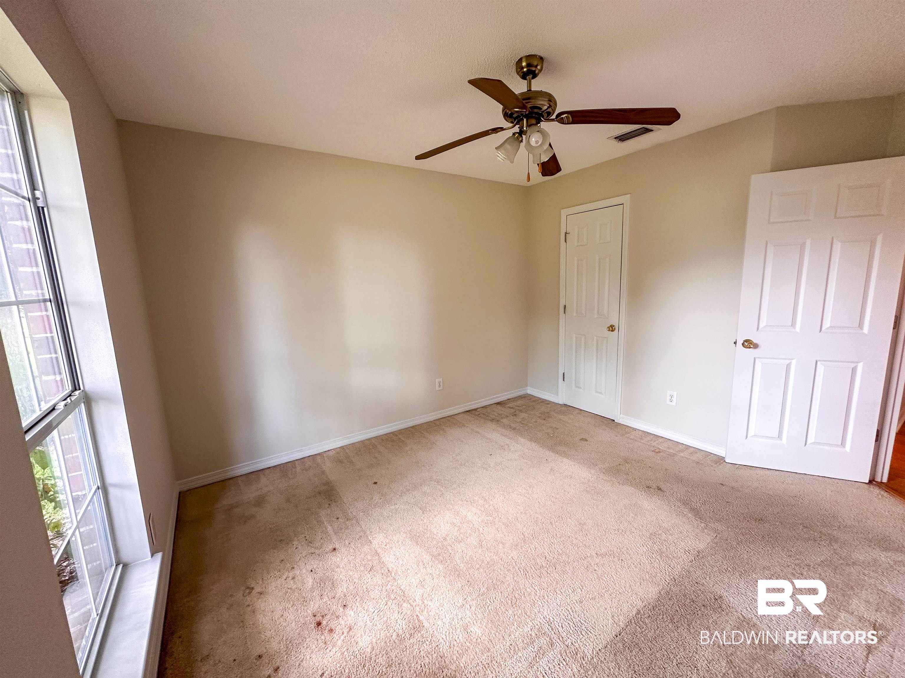 13255 Pointer Drive West Foley, AL 36535 - Photo 22 of 25 Unfurnished bedroom with light colored carpet and ceiling fan