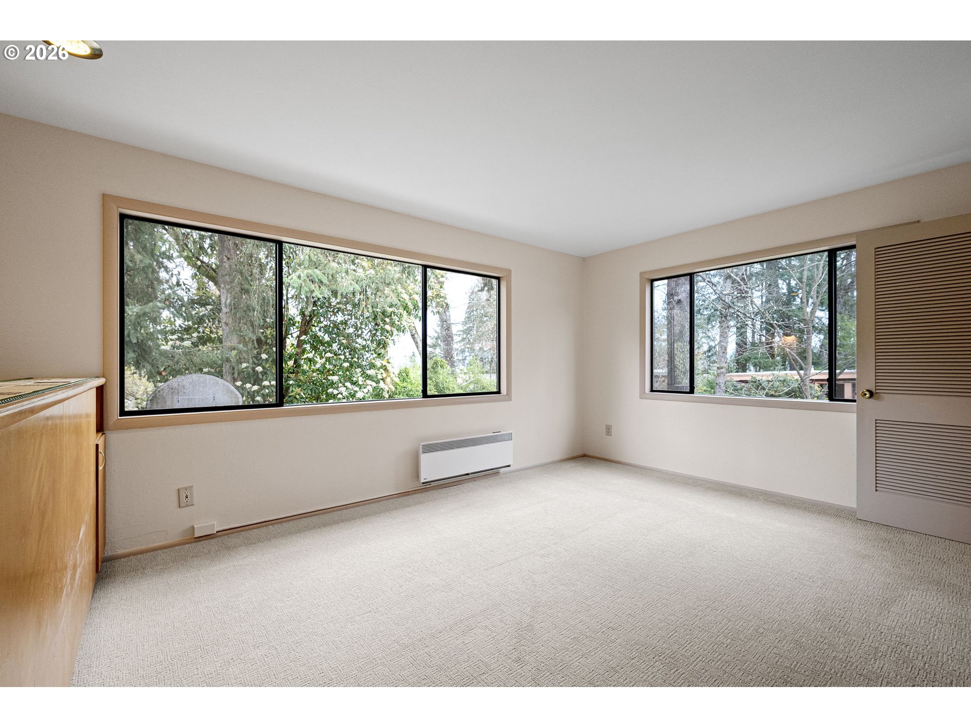 75 West 35th Place Eugene, OR 97405 - Photo 34 of 48 a view of an empty room with a window