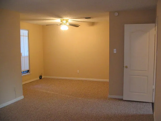 an empty room with a door