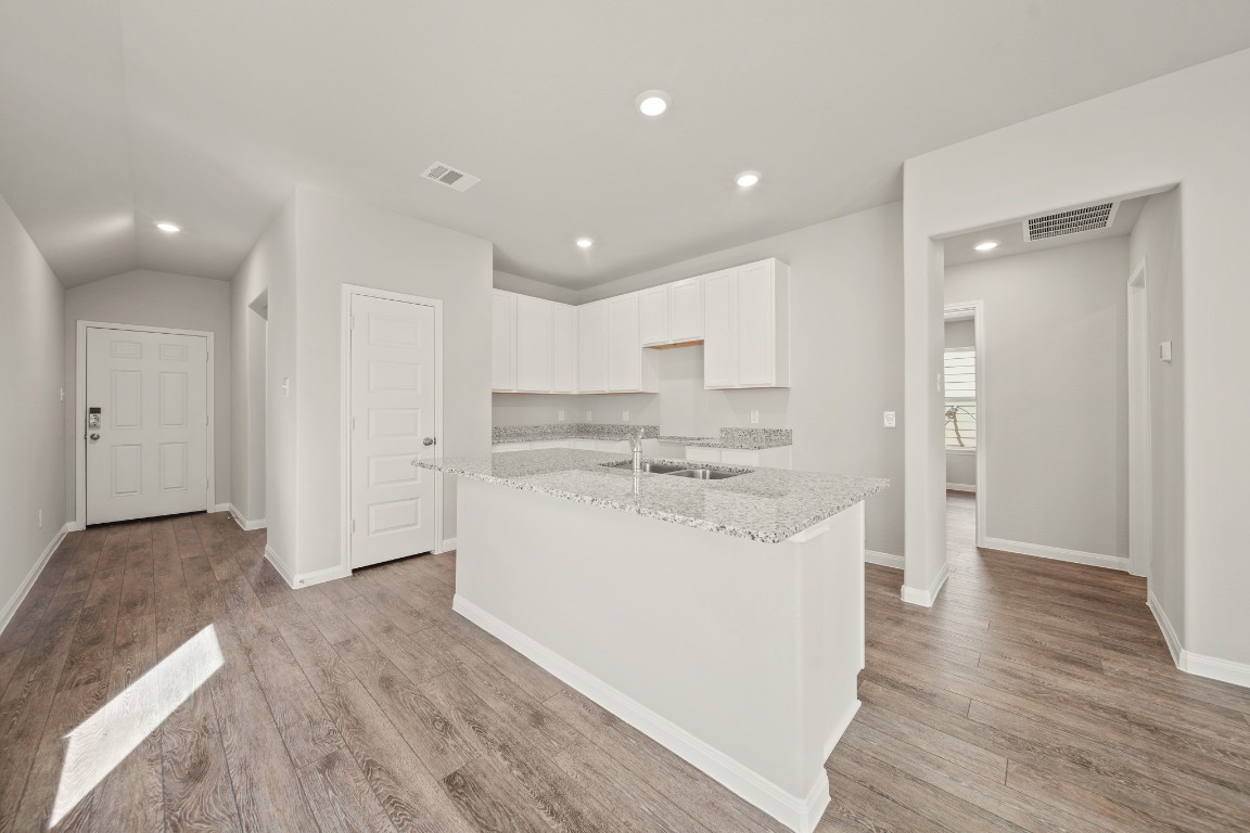13655 Kit Run Splendora, TX 77372 - Photo 2 of 25 a view of a kitchen with wooden floor