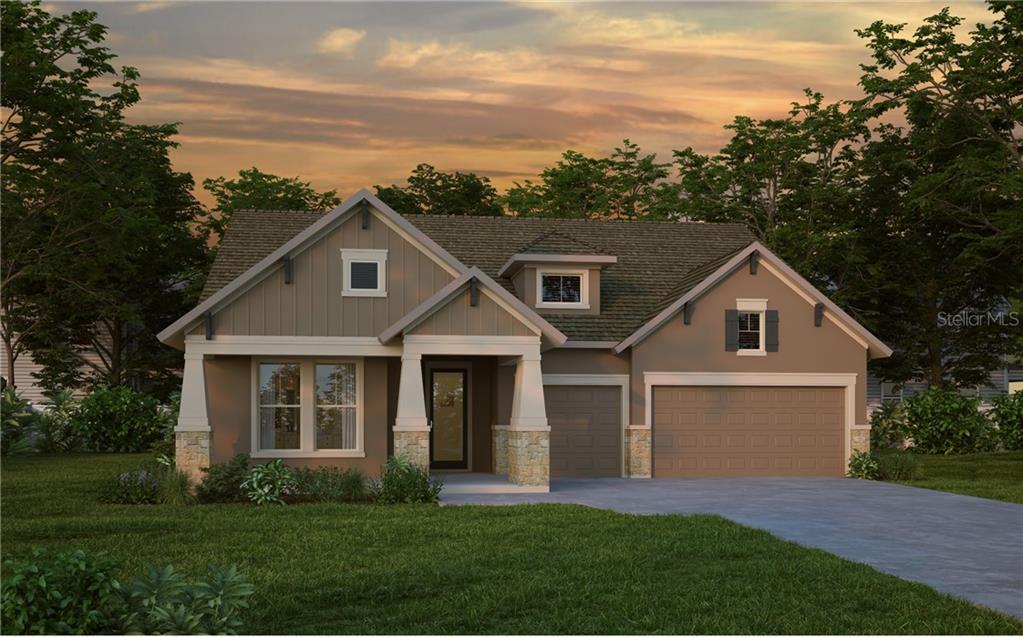 5925 Silver Sun Drive Apollo Beach, FL 33572 - Photo 1 of 1 a front view of a house with a garden and plants