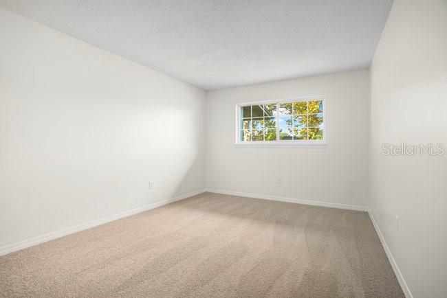 1695 Lee Road, Unit E204 Winter Park, FL 32789 - Photo 16 of 27 an empty room with a window