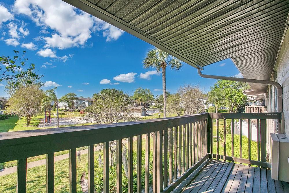 1695 Lee Road, Unit E204 Winter Park, FL 32789 - Photo 22 of 27 a view of a street from a balcony