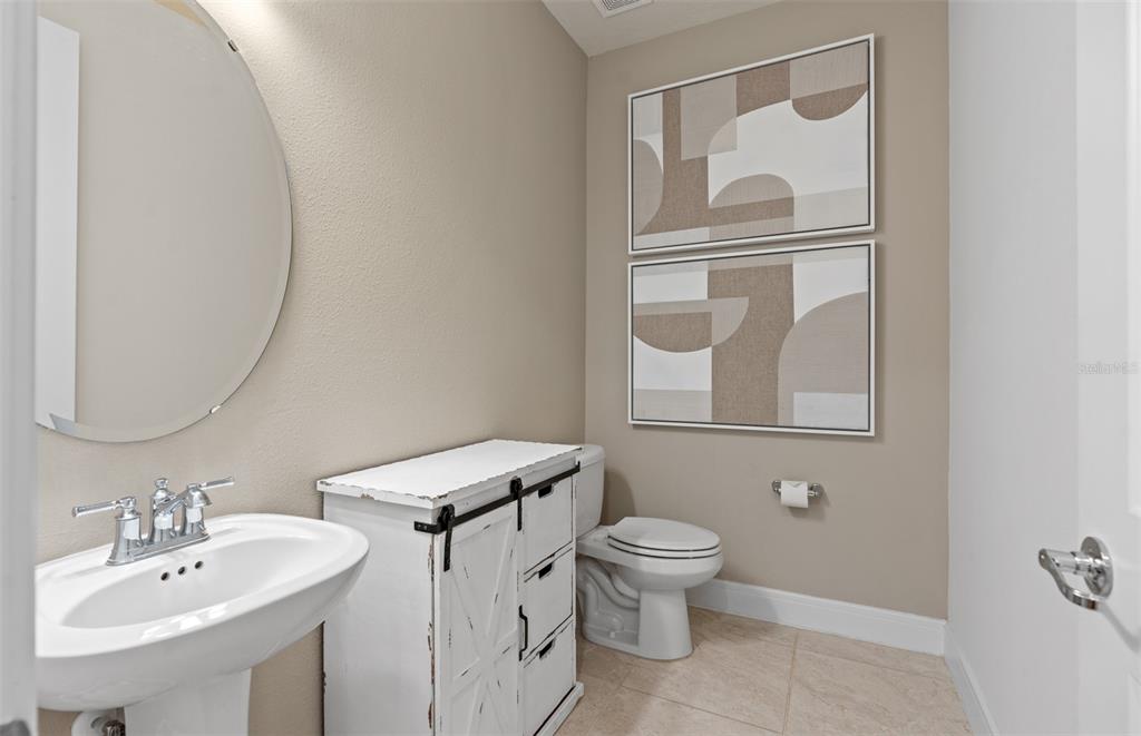 1536 Groveline Road St. Cloud, FL 34771 - Photo 14 of 17 Model Home Design Only. Pictures and furnishings are for illustrative purposes only. Elevations, colors and options may vary. Furniture is for model home staging only.?