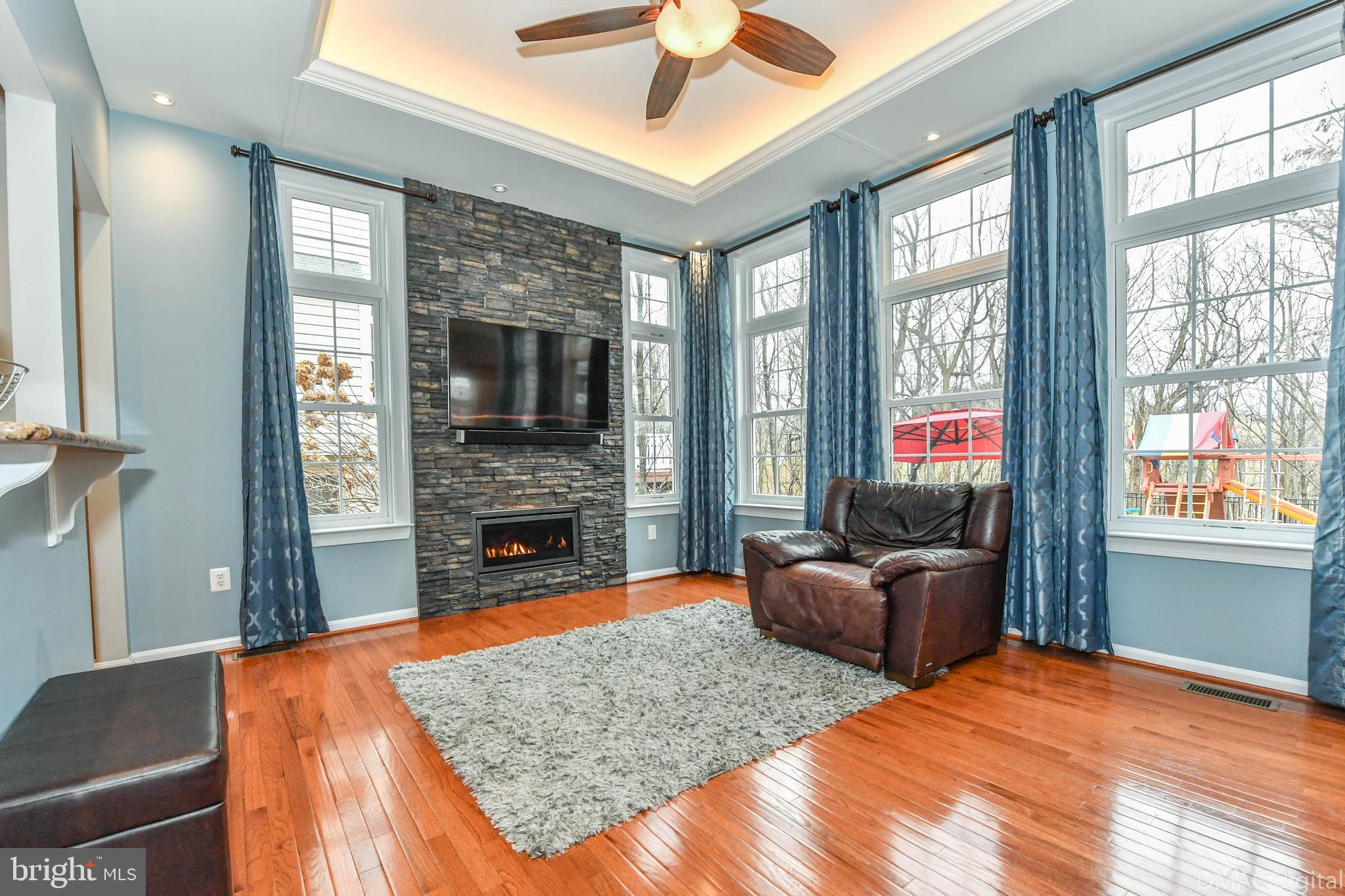 1604 Rising Ridge Road Mount Airy, MD 21771 - Photo 16 of 56 Relax by the fire with integrated LED lighting.