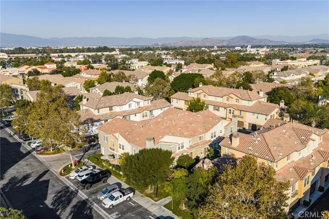 an aerial view of residential building with parking space