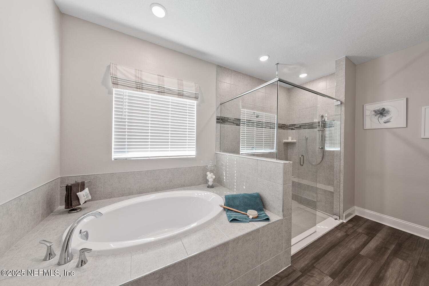 56310 Creekside Way Callahan, FL 32011 - Photo 23 of 47 a white bath tub sitting next to a window