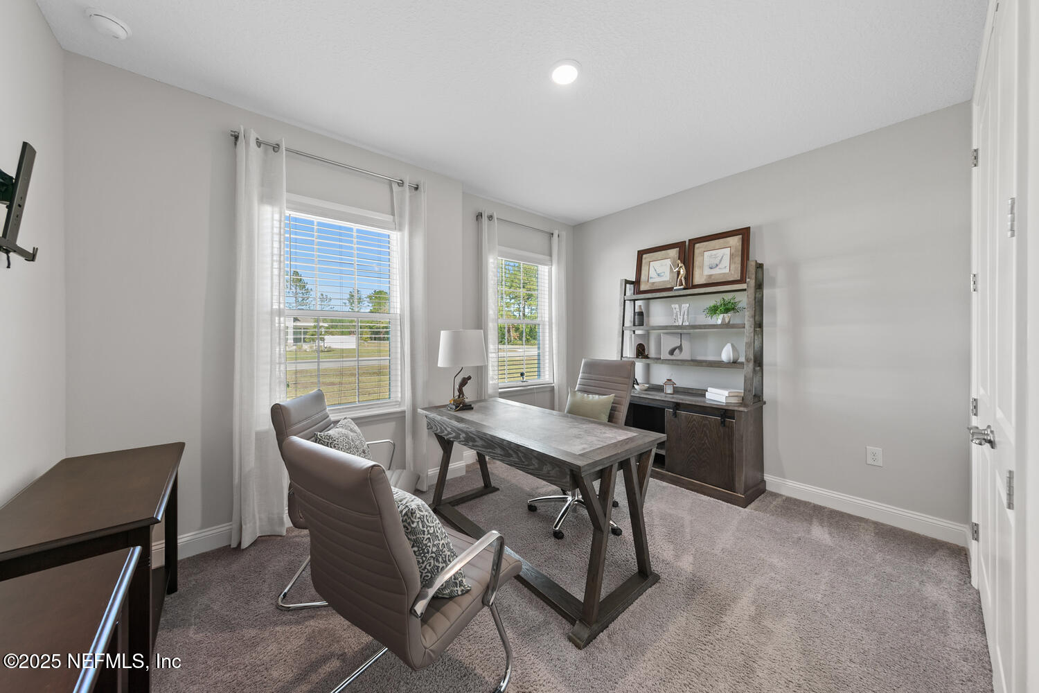 56310 Creekside Way Callahan, FL 32011 - Photo 26 of 47 a view of a dining room with furniture window and outside view