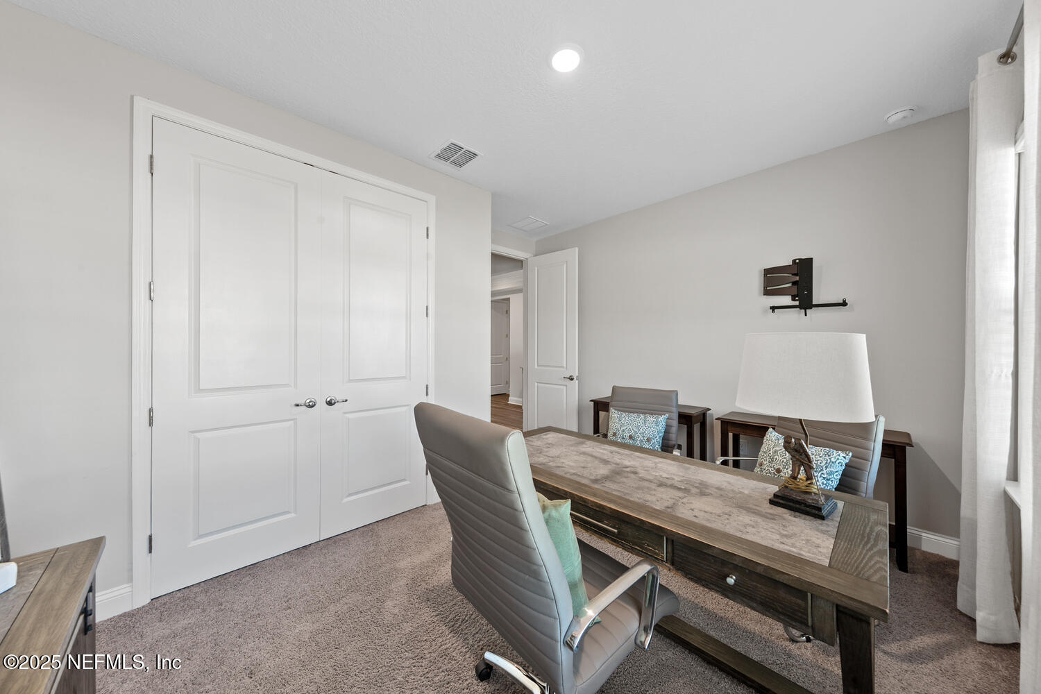 56310 Creekside Way Callahan, FL 32011 - Photo 27 of 47 a view of a dining room with furniture
