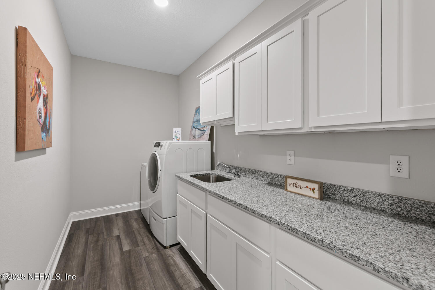 56310 Creekside Way Callahan, FL 32011 - Photo 30 of 47 a kitchen with a sink and cabinets