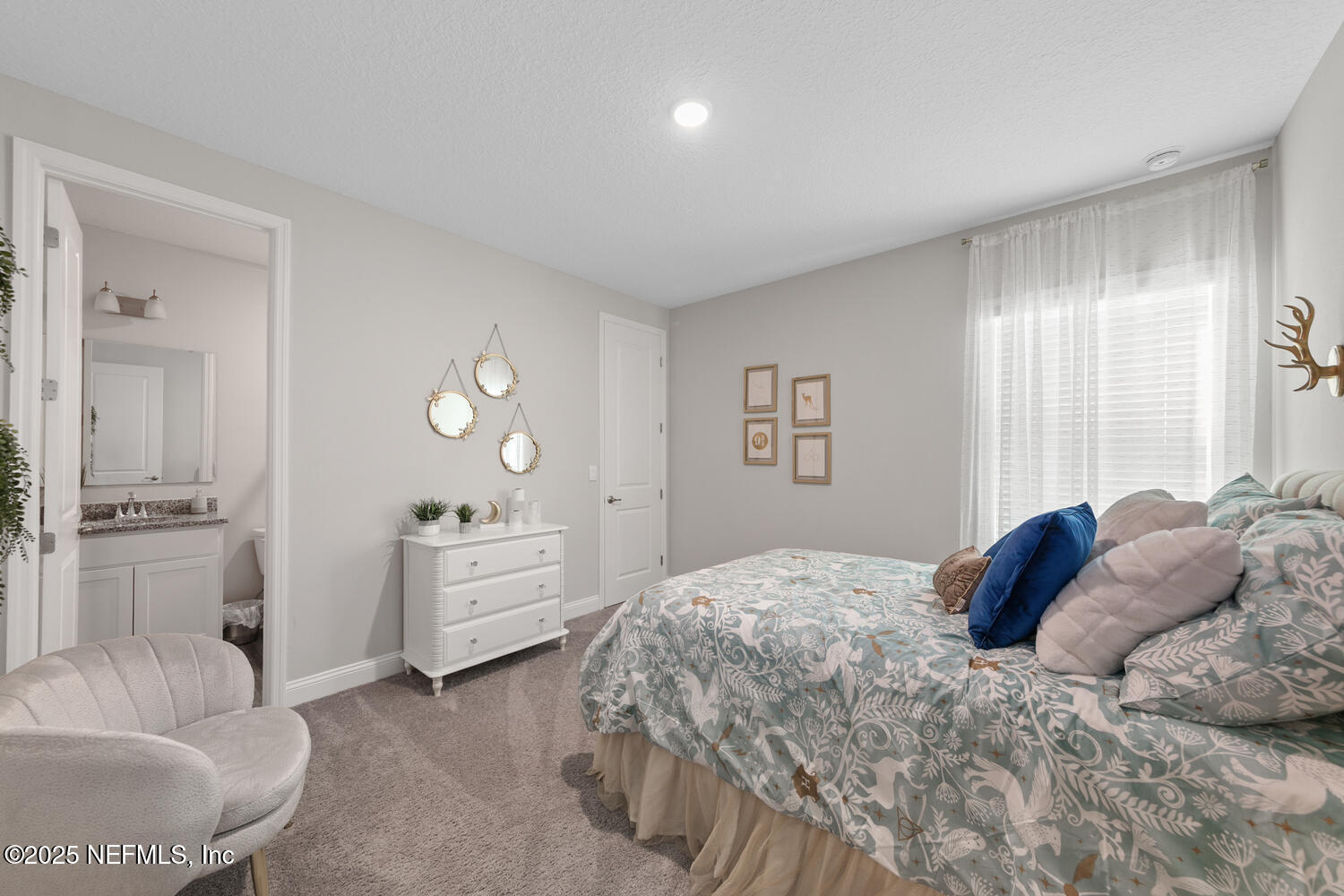 56310 Creekside Way Callahan, FL 32011 - Photo 31 of 47 a bedroom with a bed and a couch