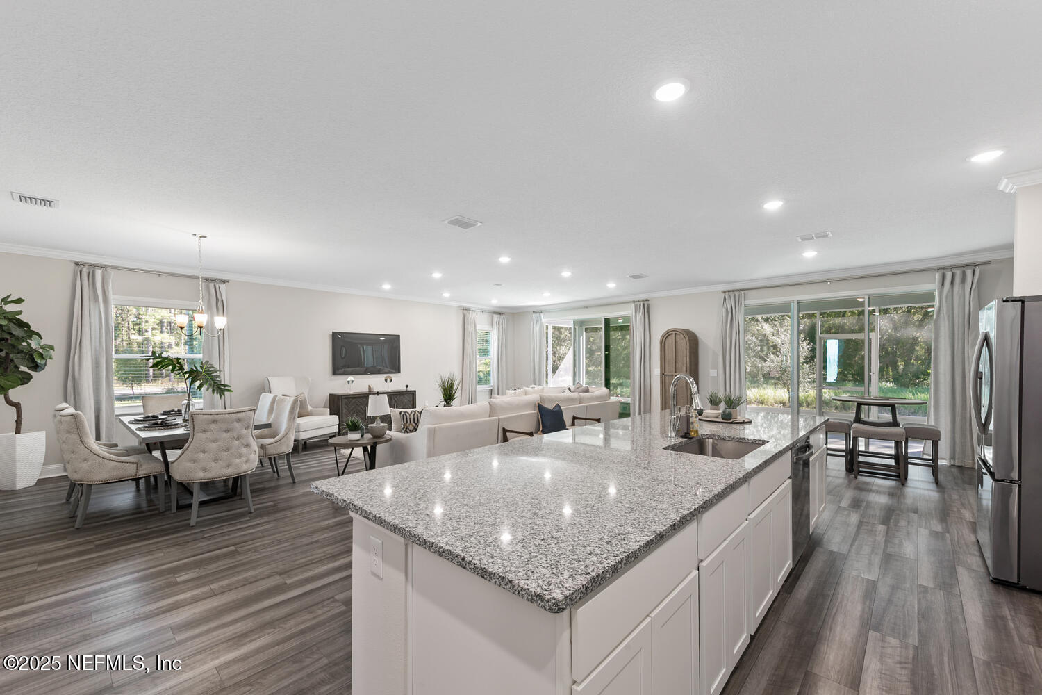 56310 Creekside Way Callahan, FL 32011 - Photo 10 of 47 a view of a living room and dining room