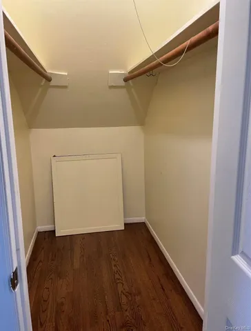 a view of small space with wooden floor