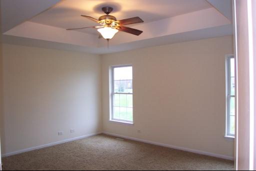 8311 Eagle Ridge Spring Grove, IL 60081 - Photo 12 of 16 an empty room with a window