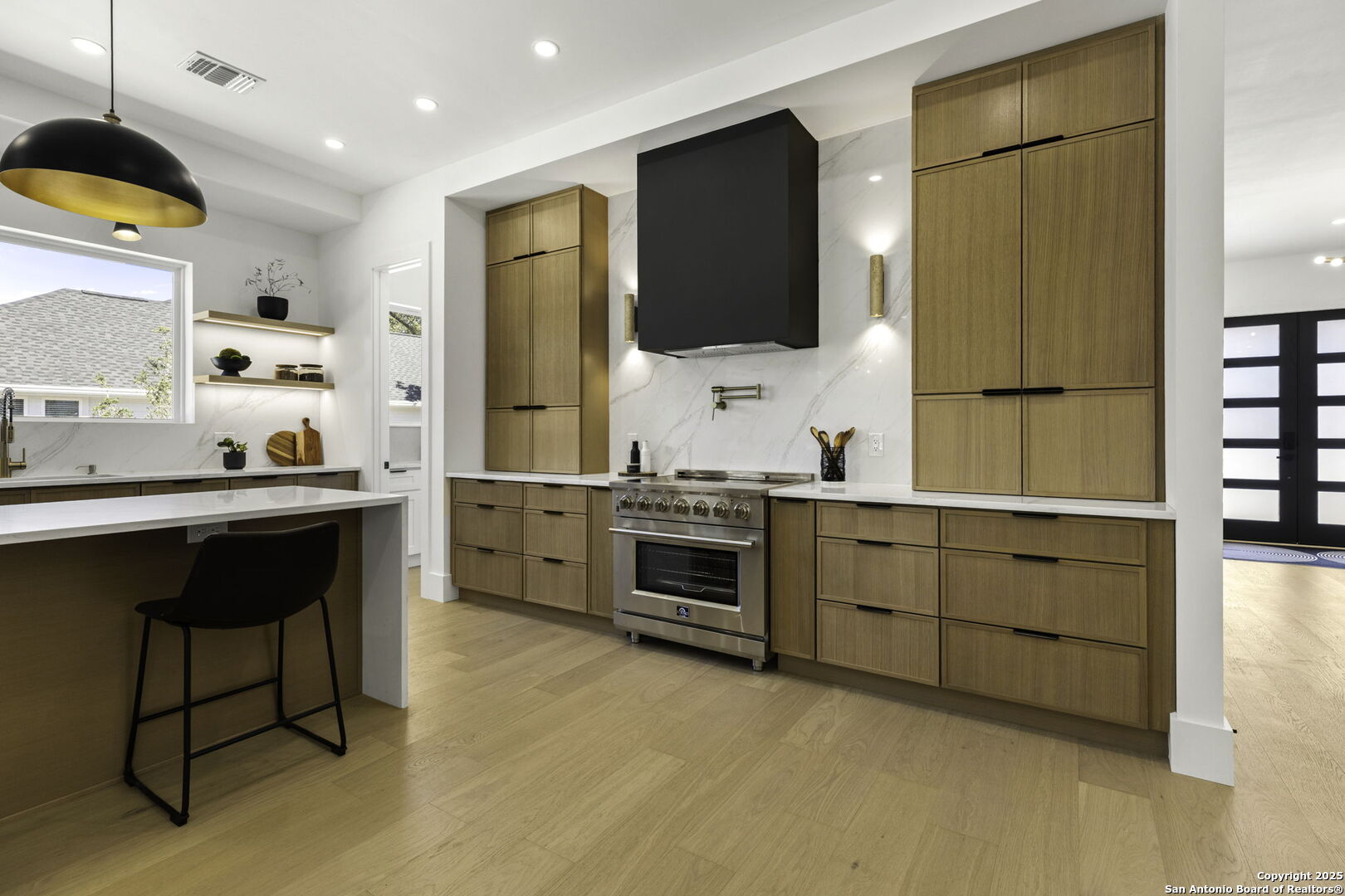 120 River View Boerne, TX 78006 - Photo 12 of 42 a kitchen with stainless steel appliances a stove a sink and a refrigerator