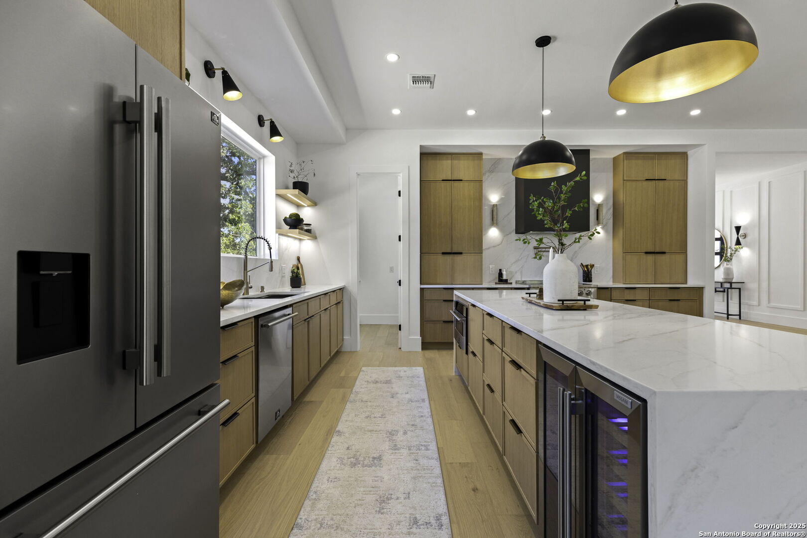 120 River View Boerne, TX 78006 - Photo 14 of 42 a large kitchen with stainless steel appliances granite countertop a lot of counter space and a sink