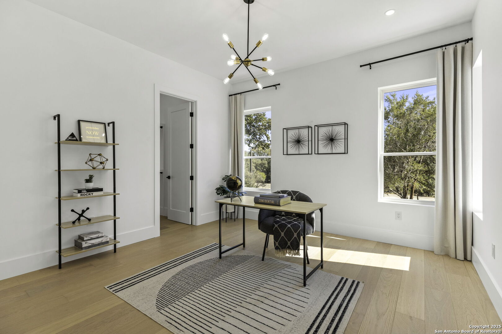 120 River View Boerne, TX 78006 - Photo 16 of 42 a view of a workspace with furniture and a window