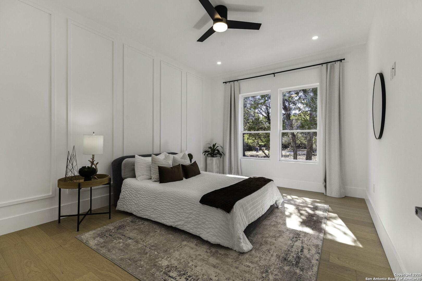 120 River View Boerne, TX 78006 - Photo 24 of 42 a spacious bedroom with a bed and a window