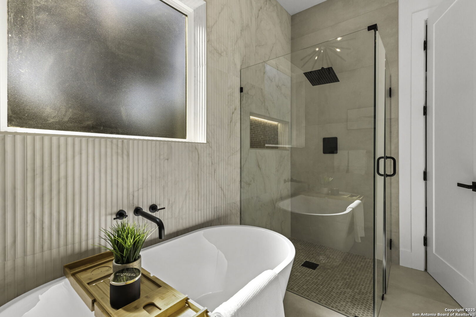 120 River View Boerne, TX 78006 - Photo 29 of 42 a bath room with a sink and a mirror