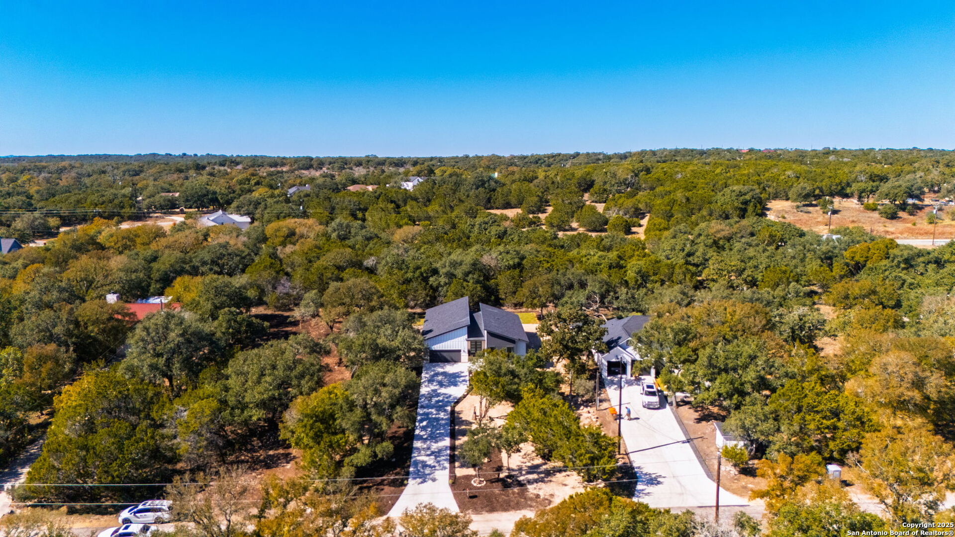 120 River View Boerne, TX 78006 - Photo 37 of 42 an aerial view of residential building and trees around