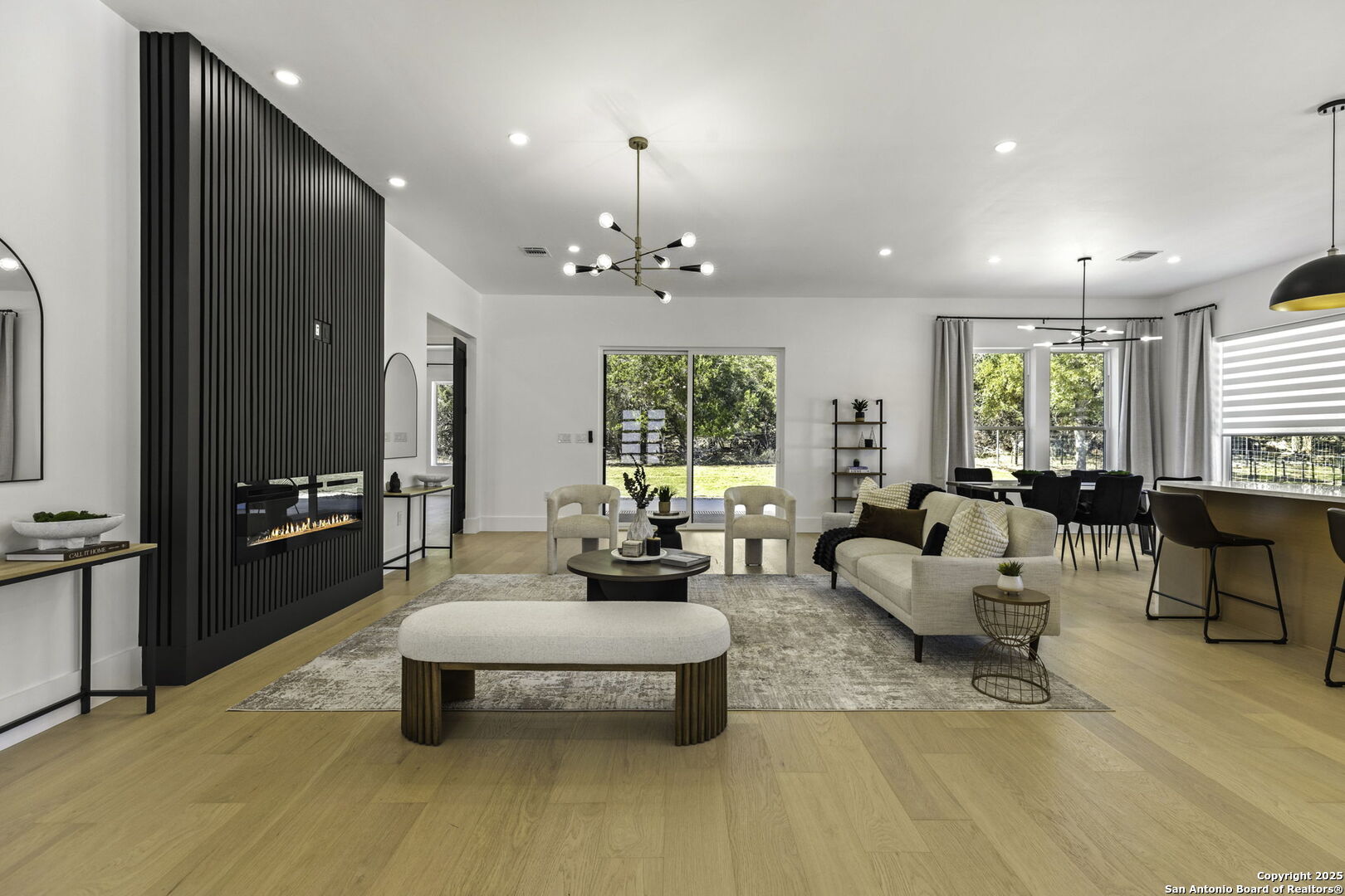 120 River View Boerne, TX 78006 - Photo 7 of 42 a living room with furniture and a chandelier