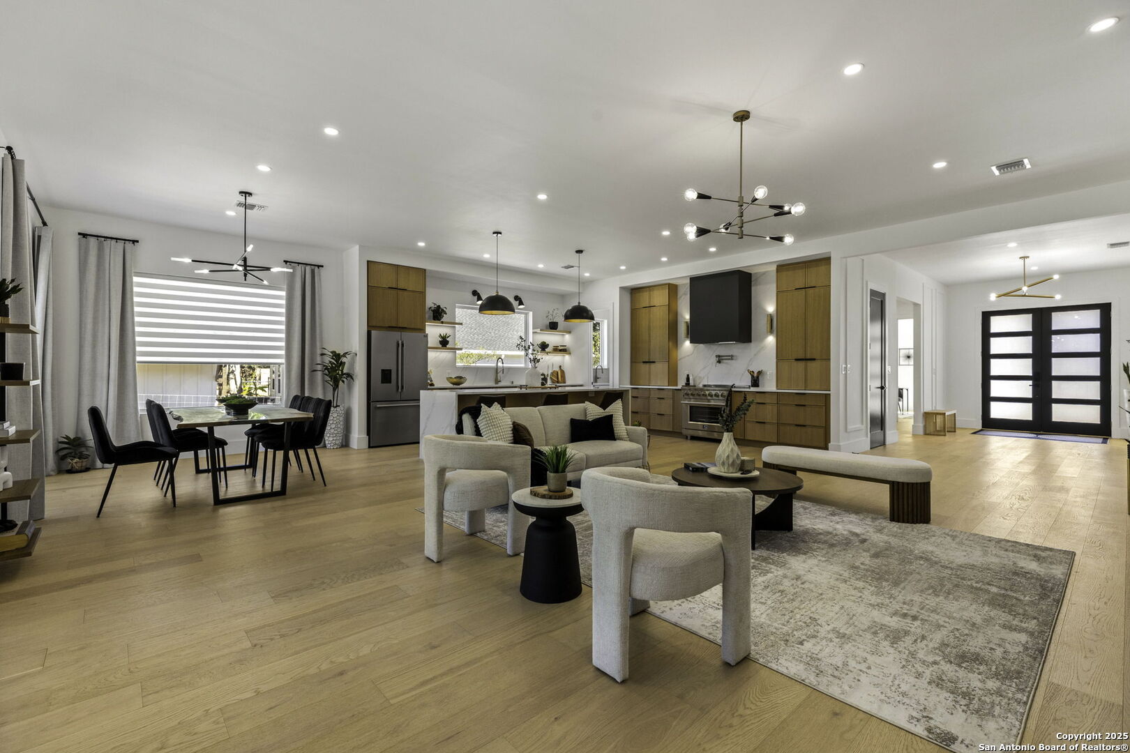 120 River View Boerne, TX 78006 - Photo 9 of 42 a living room with lots of furniture and kitchen view