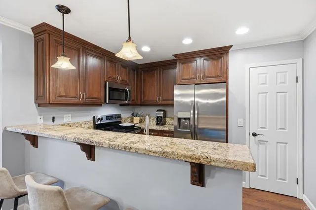 $699,999 | 7702 Caminito Puerto, Unit 204, Carlsbad, CA 92009