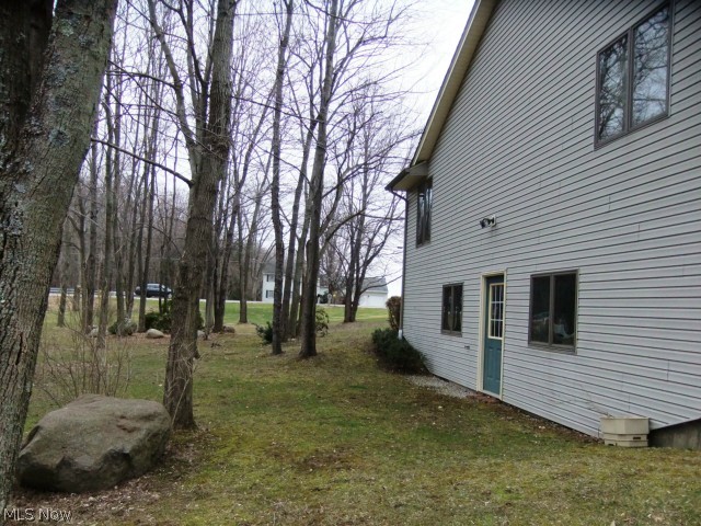 7405 State Road Wadsworth, OH 44281 - Photo 23 of 25 Left side of home (facing street).