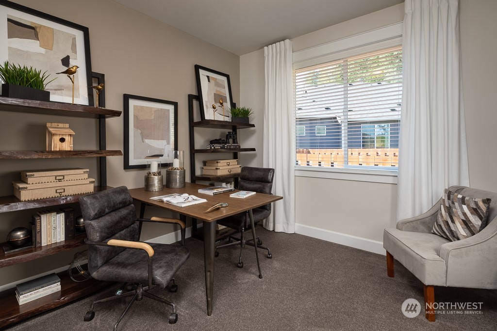 2835 Arrowroot Street Southeast Lacey, WA 98513 - Photo 11 of 19 a view of a workspace with furniture and a window