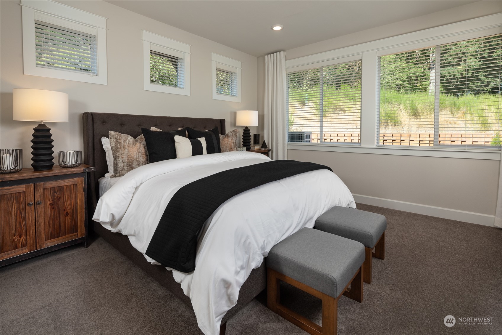 2835 Arrowroot Street Southeast Lacey, WA 98513 - Photo 6 of 19 a spacious bedroom with a bed and window