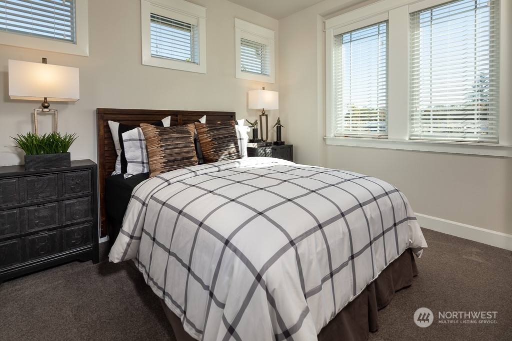 2835 Arrowroot Street Southeast Lacey, WA 98513 - Photo 9 of 19 a bedroom with a bed and window