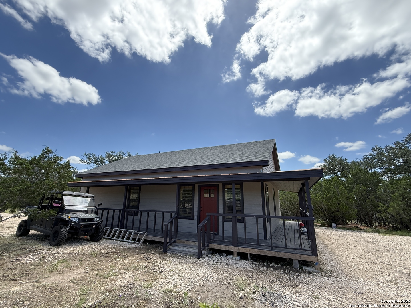 1540 Rough Rider Road Junction, TX 76874 - Photo 28 of 31 a view of a house with a yard and roof