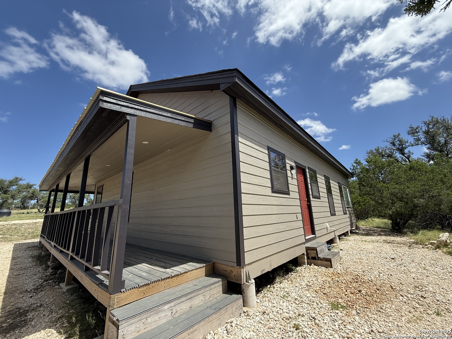 1540 Rough Rider Road Junction, TX 76874 - Photo 29 of 31 a view of a house with wooden fence