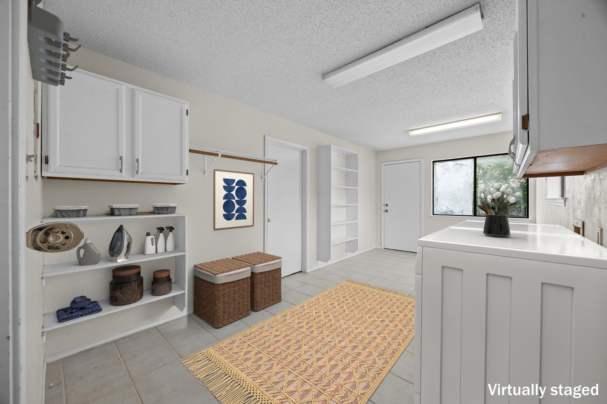 1000 West Noton Street Pflugerville, TX 78660 - Photo 18 of 35 a view of a kitchen with fridge and workspace