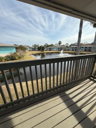 a view of a balcony with an outdoor space