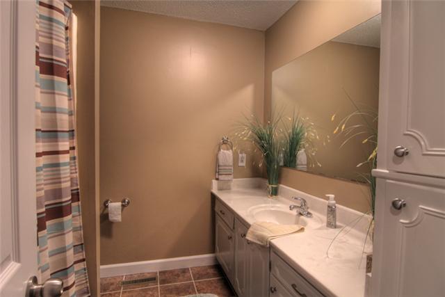 4038 Confederate Road Murfreesboro, TN 37128 - Photo 15 of 16 Master Bath has tile floors, shower/tub combo, extra large vanity space, and linen storage