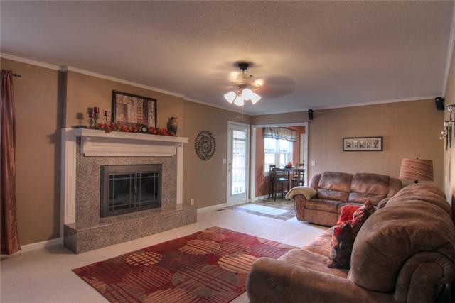 4038 Confederate Road Murfreesboro, TN 37128 - Photo 6 of 16 Cozy Den/Family room w/firplace that has granite surround and gas logs