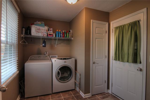 4038 Confederate Road Murfreesboro, TN 37128 - Photo 10 of 16 Have no trouble doing laundry here! Tile floor and extra storage closet!