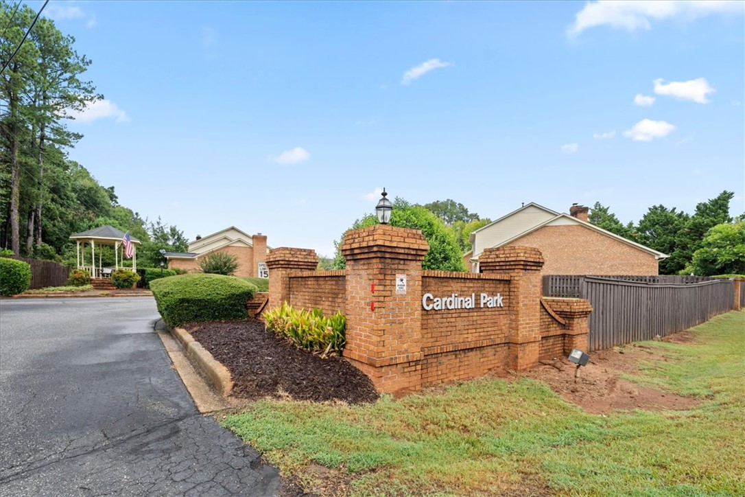 2004 Cardinal Park Drive Anderson, SC 29621 - Photo 2 of 40 Brick entrance monuments flank the paved roadway leading into a peaceful residential neighborhood.