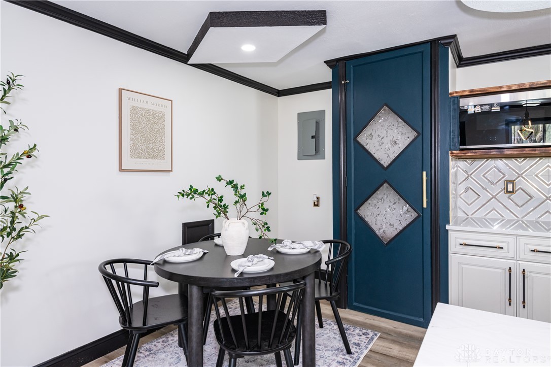 5240 Haverfield Road Dayton, OH 45432 - Photo 15 of 58 This cozy dining nook combines sleek design with convenient kitchen access.
