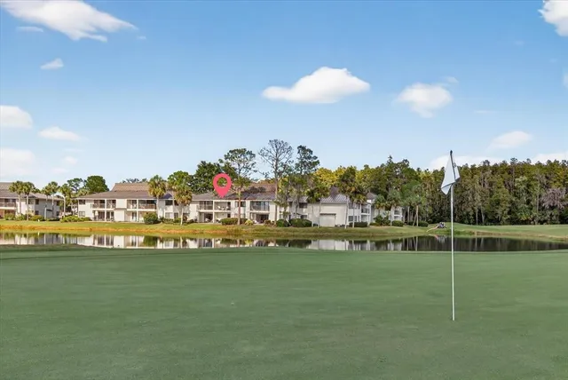 a view of a lake with a city